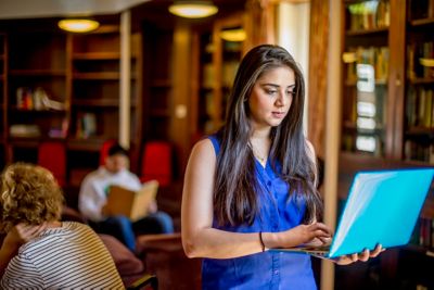 Undergraduate student studying in Rutland Hall, University Park