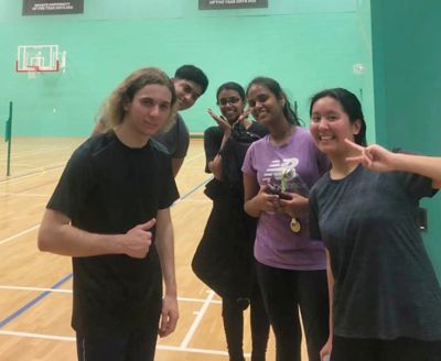 A group of friends take a break from sport