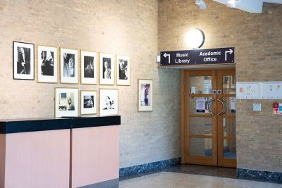 Sign for Denis Arnold Music Library at the entrance of building.