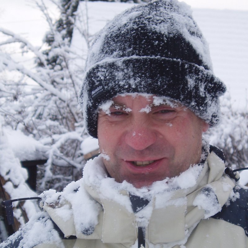 Doug Ingram smiling covered in snow