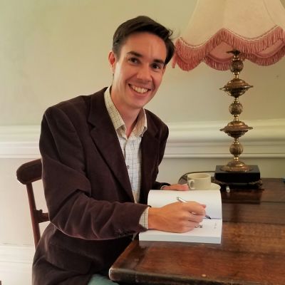 Jonathan Spurrell - sitting at a desk