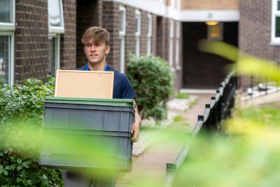 First year undergraduate student arriving at Hugh Stewart  Hall accommodation