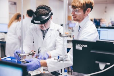 Laboratory staff helping second year undergraduates in a chemistry lab session, Chemistry building, University Park. November 5th 2021.