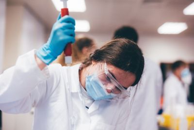 Laboratory staff helping second year undergraduates in a chemistry lab session, Chemistry building, University Park. November 5th 2021.