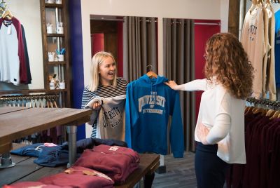 Undergraduate students inside Portland Clothing Co, University Park