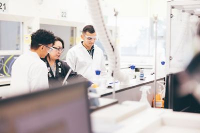 Laboratory staff helping second year undergraduates in a chemistry lab session, Chemistry building, University Park. November 5th 2021.