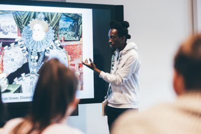 University undergraduates attending an Art History seminar with academic Professor Gaby Neher in the Monica Partridge building
