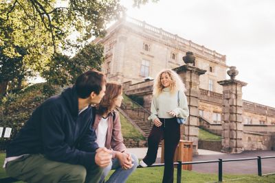Undergraduate students visiting Nottingham Castle, Nottingham City Centre - November 2021.Fearne Darbyshire (curly blonde hair); Luca Ion (cap) and Dominic Beale (red shirt).