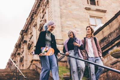 Undergraduate students visiting Nottingham Castle, Nottingham City Centre - November 2021.Izzy Armorgie (blue hair); Mariam Abedraba Abdalla (pink hat) and Dominic Beale (red shirt).