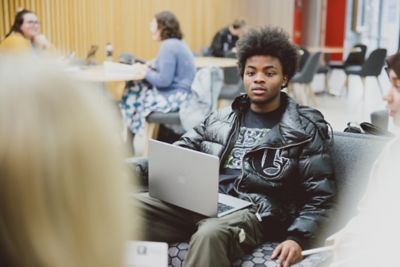 Students relaxing in Humanities Building - communal area