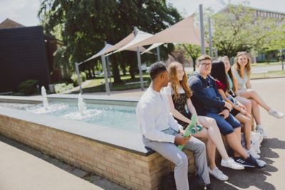 Undergraduate students outside Humanities Building, University Park