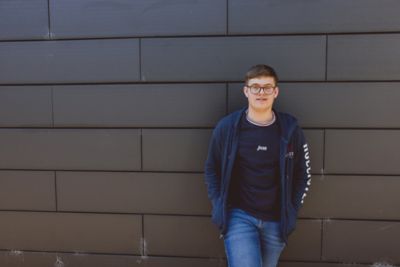 Undergraduate student outside Humanities Building, University Park