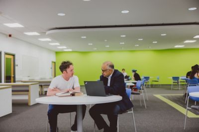 Undergraduate student 1:1 in Greenfield Medical Library, Queen's Medical Centre Medical School, University Park