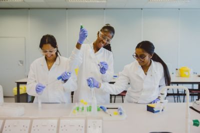 Laboratory staff helping second year undergraduates in a chemistry lab session, Chemistry building, University Park. November 5th 2021.