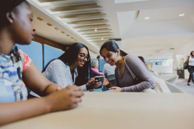 Undergraduate students in the reception area, Medical School, QMC, University Park