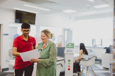 Undergraduate student meeting with a staff member in Student Support Centre, Queen's Medical Centre, University Park