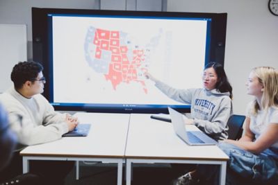 Undergraduate students in a Politics group study session, Monica Partridge building