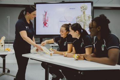 Assistant Professor teaching anatomy to undergraduate students