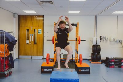 Undergraduate student jumping for sport rehabilitation exercises