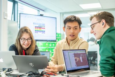 Undergraduate students Amy Gilmore, Gioh Meng Jang, Kieran Jennings, working on a group project in the EEE Project Space, Hackspace, Pope Building BO1