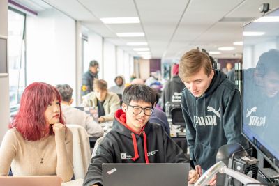 Undergraduate students Shun Yao and Callum McColm working at a screen on a group project in the EEE Collaborative Teaching and Project Lab 1, Pope Building BO1