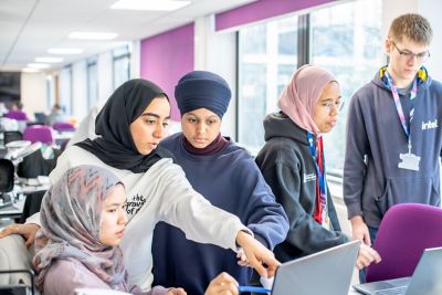 Undergraduate students working at a laptop on a group project in our EEE Collaborative Teaching and Project Lab 1, Pope Building BO1