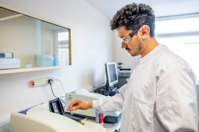 Assistant Professor in Food Material Science Vlad Dinu preparing samples in Light scattering Lab