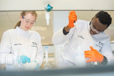 Undergraduate pharmacy students in a laboratory